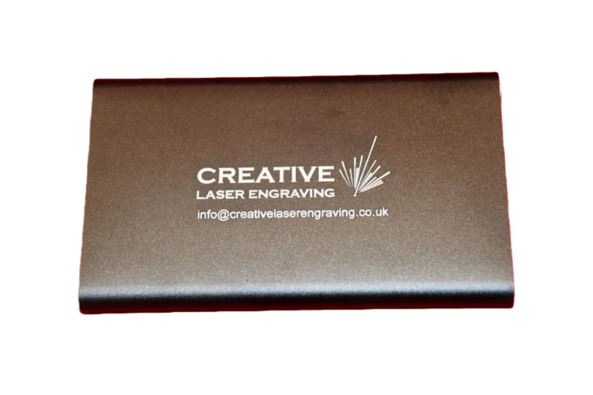 Factory setup for laser engraving anodized aluminum